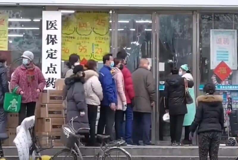 citizens_of_wuhan_lining_up_outside_of_a_drug_store_to_buy_masks_during_the_wuhan_coronavirus_outbreak